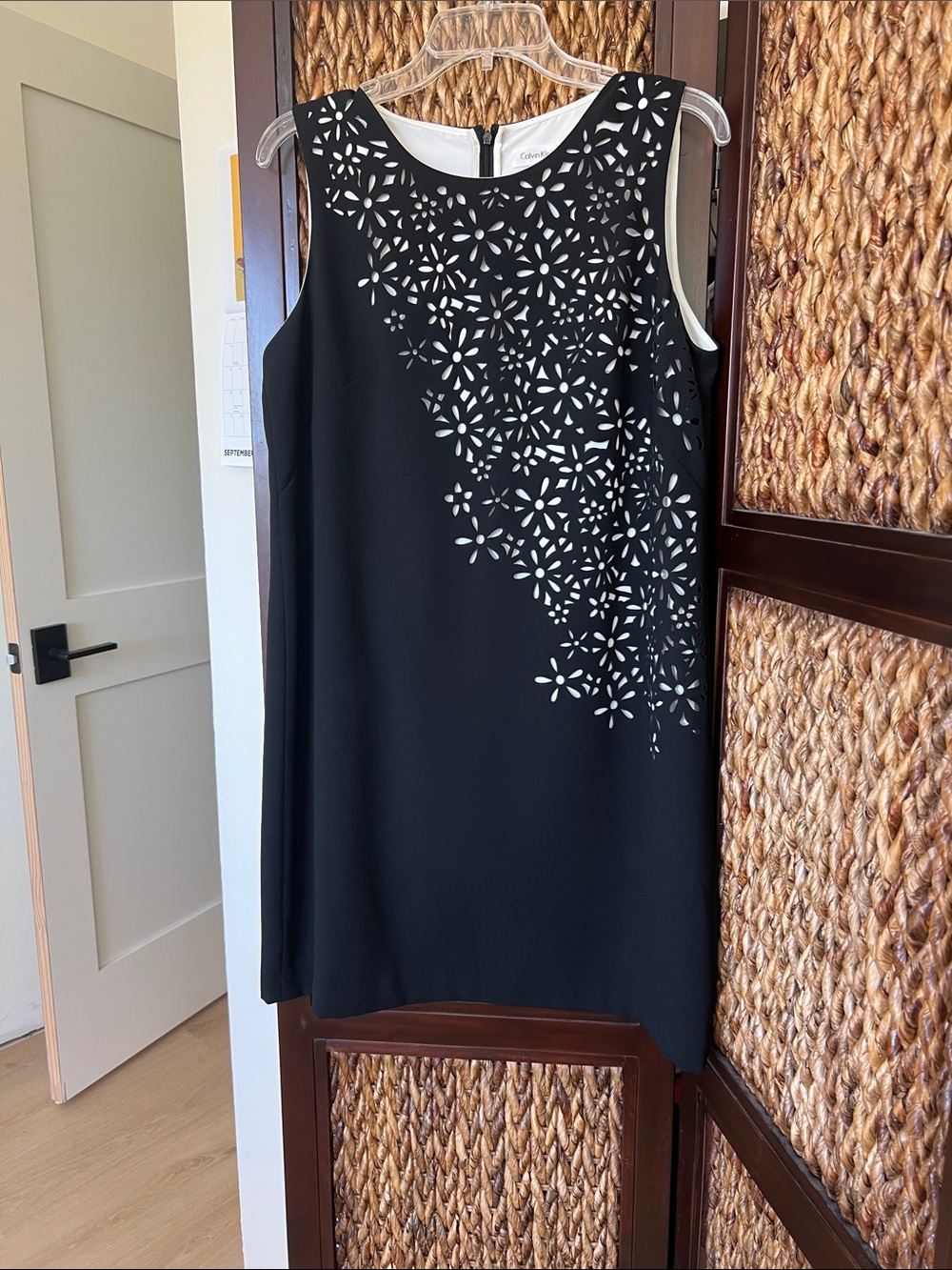 Like new Calvin Klein Black Sleeveless Shift Dress with White Floral Cutouts